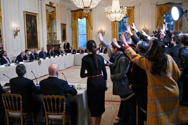 Journalists (R) ask questions as US President Donald Trump hosts a meeting with US oil company executives in the East Room of the White House in Washington, DC on January 9, 2026. President Trump is aiming to convince oil executives to support his plans in Venezuela, a country whose energy resources he says he expects to control for years to come. US forces seized Venezuelan president Nicolas Maduro in a sweeping military operation on January 3, with Trump making no secret that control of Venezuela's oil was at the heart of his actions. (Photo by Brendan SMIALOWSKI / AFP)