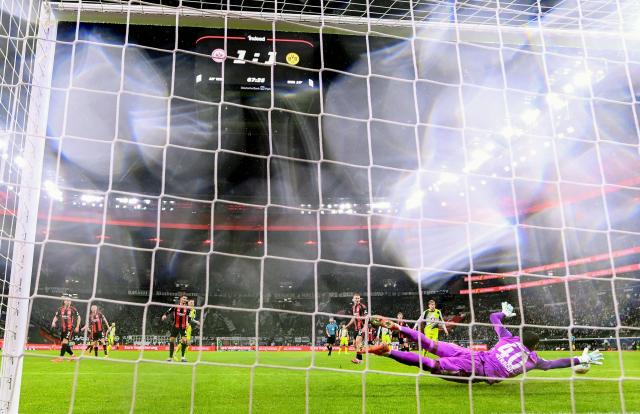 Dortmund's German midfielder #08 Felix Nmecha (not in picture) scores the 1-2 goal past Frankfurt's Brazilian goalkeeper #40 Kaua Santos during the German first division Bundesliga football match between Eintracht Frankfurt and BVB Borussia Dortmund in Frankfurt am Main, western Germany, on January 9, 2026. (Photo by Kirill KUDRYAVTSEV / AFP) / DFL REGULATIONS PROHIBIT ANY USE OF PHOTOGRAPHS AS IMAGE SEQUENCES AND/OR QUASI-VIDEO