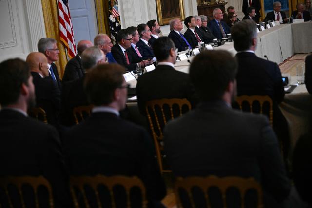 US President Donald Trump (C-L) meets with US oil company executives in the East Room of the White House in Washington, DC on January 9, 2026. President Trump is aiming to convince oil executives to support his plans in Venezuela, a country whose energy resources he says he expects to control for years to come. US forces seized Venezuelan president Nicolas Maduro in a sweeping military operation on January 3, with Trump making no secret that control of Venezuela's oil was at the heart of his actions. (Photo by Brendan SMIALOWSKI / AFP)