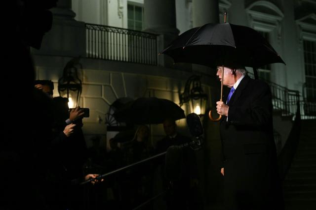 US President Donald Trump speaks to reporters as he departs from the South Lawn of the White House in Washington, DC, on January 9, 2026. Trump is traveling to Mar-a-Lago for the weekend. (Photo by Brendan SMIALOWSKI / AFP)