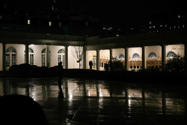 US President Donald Trump walks on the Colonnade prior departure from the South Lawn of the White House in Washington, DC, on January 9, 2026. (Photo by Brendan SMIALOWSKI / AFP)