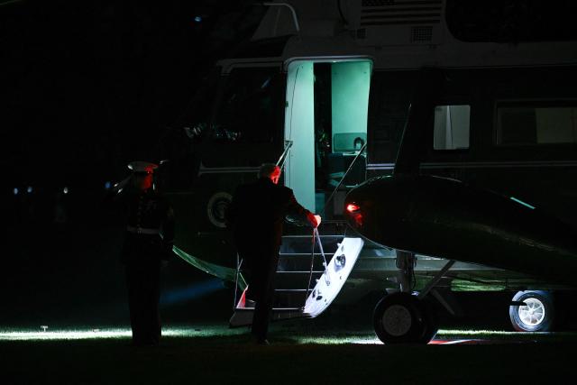 US President Donald Trump boards Marine One as he departs from the South Lawn of the White House in Washington, DC, on January 9, 2026. (Photo by Brendan SMIALOWSKI / AFP)