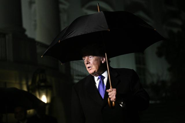 US President Donald Trump speaks to reporters as he departs from the South Lawn of the White House in Washington, DC, on January 9, 2026. Trump is traveling to Mar-a-Lago for the weekend. (Photo by Brendan SMIALOWSKI / AFP)