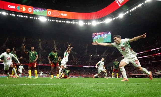 Morocco's forward #10 Brahim Diaz (R) celebrates scoring his team's first goal during the Africa Cup of Nations (CAN) quarter-final football match between Cameroon and Morocco at the Prince Moulay Abdallah stadium in Rabat on January 9, 2026. (Photo by Paul ELLIS / AFP)