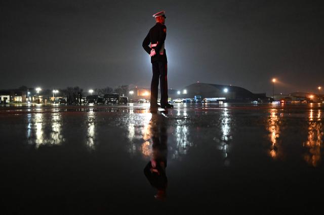 A US Marine honor guard waits for the arrival of US President Donald Trump at Joint Base Andrews, Maryland on January 9, 2026. Trump is traveling to Mar-a-Lago for the weekend. (Photo by ANDREW CABALLERO-REYNOLDS / AFP)