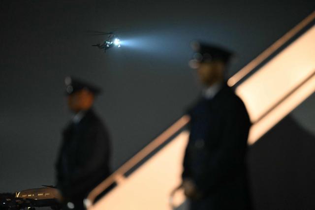 US Marine One carrying US President Donald Trump prepares to land at Joint Base Andrews, Maryland on January 9, 2026. Trump is traveling to Mar-a-Lago for the weekend. (Photo by ANDREW CABALLERO-REYNOLDS / AFP)