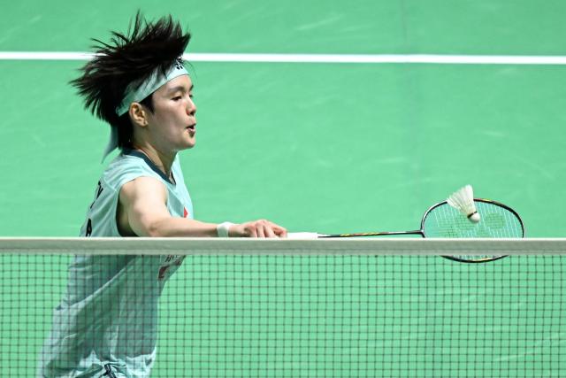 China's Wang Zhi Yi plays a point during her women's singles semi-final match against India's PV Sindhu at the Malaysia Open badminton tournament in Kuala Lumpur on January 10, 2026. (Photo by MOHD RASFAN / AFP)