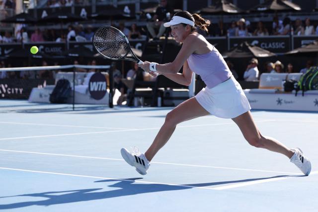 Wang Xinyu of China hits a return to Alexandra Eala of the Philippines during their women's singles semi-final match at the WTA Auckland Classic tennis tournament in Auckland on January 10, 2026. (Photo by Michael Bradley / AFP)