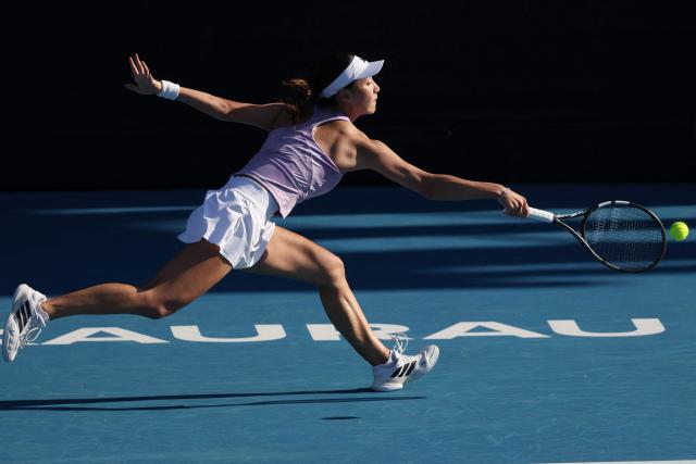 Wang Xinyu of China hits a return to Alexandra Eala of the Philippines during their women's singles semi-final match at the WTA Auckland Classic tennis tournament in Auckland on January 10, 2026. (Photo by Michael Bradley / AFP)