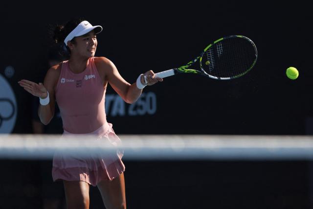 Alexandra Eala of the Philippines hits a return against Wang Xinyu of China during their women's singles semi-final match at the WTA Auckland Classic tennis tournament in Auckland on January 10, 2026. (Photo by Michael Bradley / AFP)