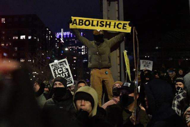 People protest against ICE after the fatal shooting of Renee Nicole Good in downtown Minneapolis, Minnesota on January 9, 2026. A US Immigration and Customs Enforcement (ICE) agent shot and killed 37-year-old Renee Nicole Good on the streets of Minneapolis on January 7, leading to huge protests and outrage from local leaders who rejected White House claims she was a domestic terrorist. (Photo by Octavio JONES / AFP)