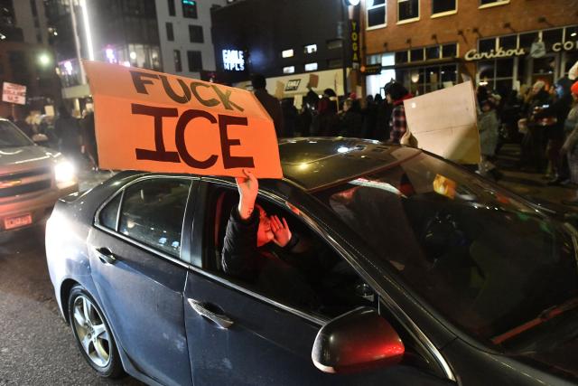 EDITORS NOTE: Graphic content / People protest against ICE after the fatal shooting of Renee Nicole Good in downtown Minneapolis, Minnesota on January 9, 2026. A US Immigration and Customs Enforcement (ICE) agent shot and killed 37-year-old Renee Nicole Good on the streets of Minneapolis on January 7, leading to huge protests and outrage from local leaders who rejected White House claims she was a domestic terrorist. (Photo by Octavio JONES / AFP)
