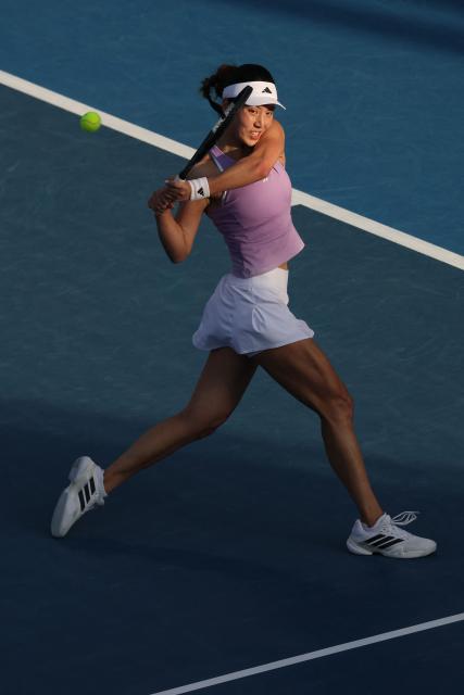 Wang Xinyu of China hits a return to Alexandra Eala of the Philippines during their women's singles semi-final match at the WTA Auckland Classic tennis tournament in Auckland on January 10, 2026. (Photo by Michael Bradley / AFP)