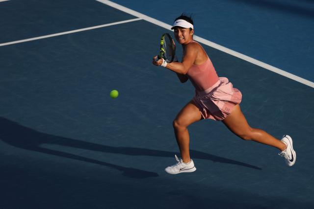 Alexandra Eala of the Philippines hits a return against Wang Xinyu of China during their women's singles semi-final match at the WTA Auckland Classic tennis tournament in Auckland on January 10, 2026. (Photo by Michael Bradley / AFP)