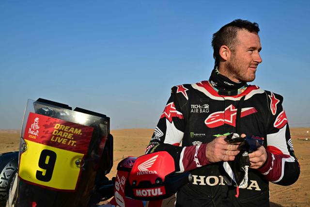 US rider Ricky Brabec watches before the start of the Stage 6 of the 48th edition of the Dakar Rally 2026, between Hail and Riyadh, Saudi Arabia, on January 9, 2026. (Photo by Giuseppe CACACE / AFP)