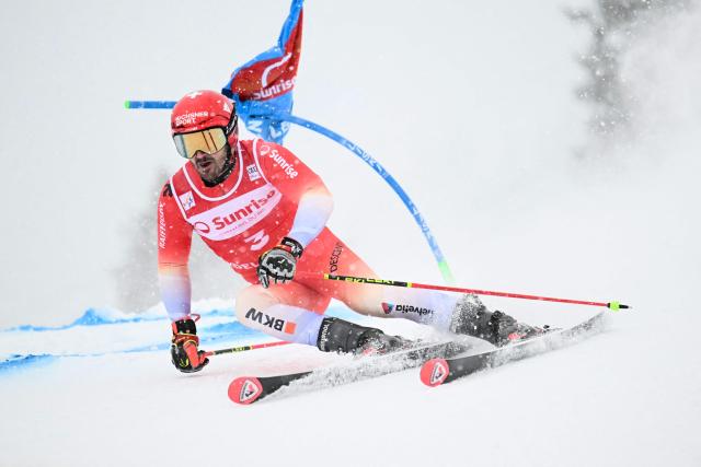 Switzerland's Loic Meillard competes in the first run of the Men's Giant Slalom, part of the FIS Alpine Ski World Cup 2025-2026 in Adelboden, soutwestern Switzerland on January 10, 2026. (Photo by Fabrice COFFRINI / AFP)