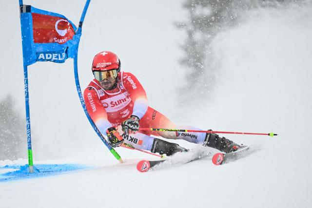 Switzerland's Loic Meillard competes in the first run of the Men's Giant Slalom, part of the FIS Alpine Ski World Cup 2025-2026 in Adelboden, soutwestern Switzerland on January 10, 2026. (Photo by Fabrice COFFRINI / AFP)