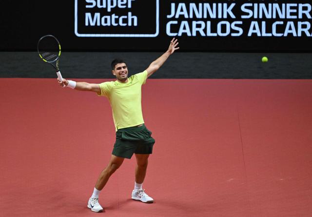 Spain's Carlos Alcaraz reacts after a point against Italy's Jannik Sinner during their exhibition tennis match at Inspire Arena in Incheon on January 10, 2026. (Photo by Jung Yeon-je / AFP)