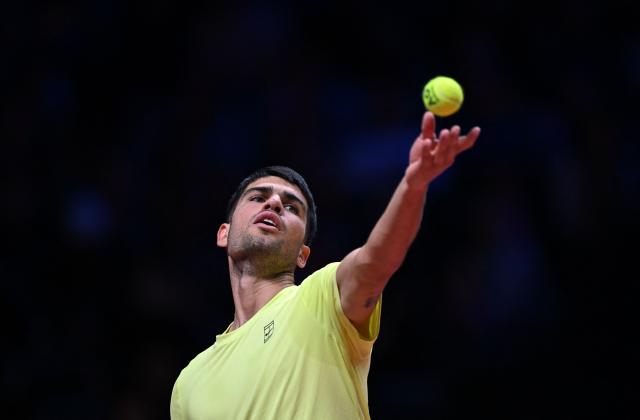 Spain's Carlos Alcaraz serves to Italy's Jannik Sinner during their exhibition tennis match at Inspire Arena in Incheon on January 10, 2026. (Photo by Jung Yeon-je / AFP)