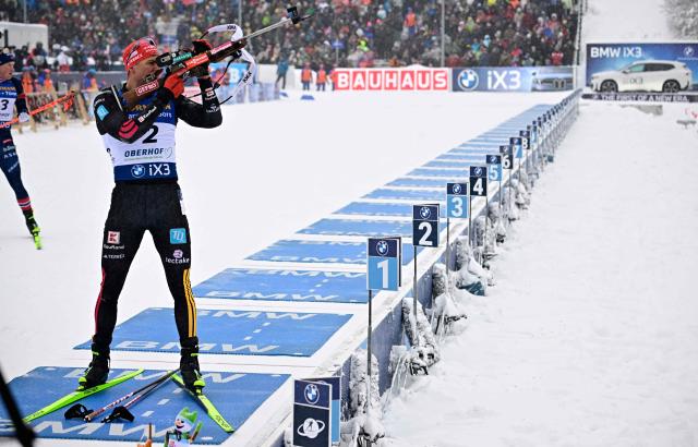 Germany's Philipp Nawrath competes at the shooting range during the men's 12,5km pursuit event of the IBU Biathlon World Cup in Oberhof, eastern Germany on January 10, 2026. (Photo by Tobias SCHWARZ / AFP)