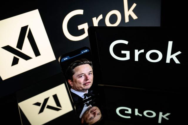 (FILES) This photograph taken on January 13, 2025 in Toulouse shows screens displaying the logo of Grok, a generative artificial intelligence chatbot developed by xAI, the American company specializing in artificial intelligence and it's founder Elon Musk. Indonesia suspended Elon Musk's AI chatbot Grok on January 10, 2026 over concerns about AI-generated pornographic content, the country's communication and digital minister said. (Photo by Lionel BONAVENTURE / AFP)