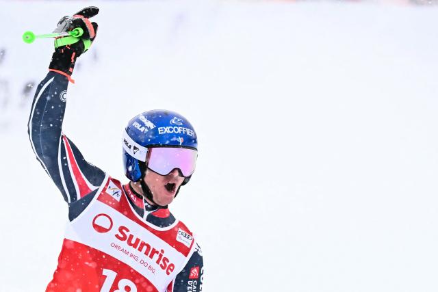 France's Leo Anguenot reacts as he crosses the finish line in the second run of the Men's Giant Slalom, part of the FIS Alpine Ski World Cup 2025-2026 in Adelboden, soutwestern Switzerland on January 10, 2026. (Photo by Fabrice COFFRINI / AFP)