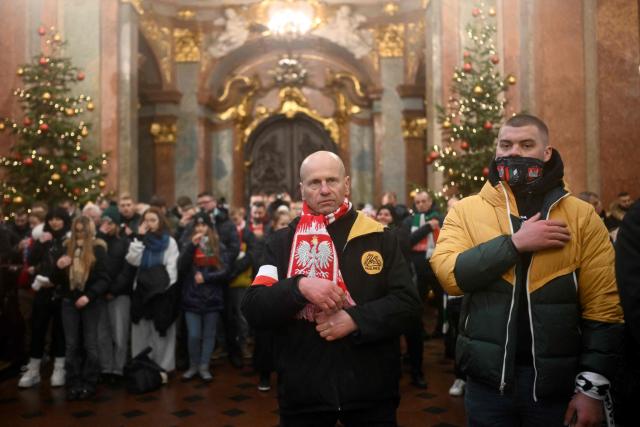 Polish football fans attend a holy mass during their annual pilgrimage at the Jasna Gora Monastery in Czestochowa on January 10, 2026. Polish football fans put aside their rivalries every year and gather at Poland’s holiest Catholic shrine the Jasna Gora Monastery in Czestochowa. (Photo by Sergei GAPON / AFP)