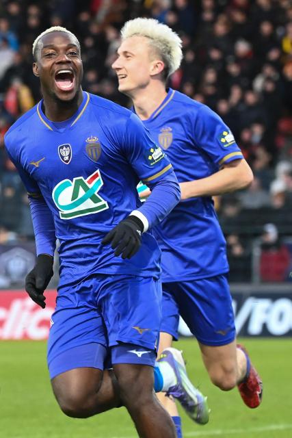 Monaco's French forward #19 George Ilenikhena celebrates scoring his team's third goal during the French Cup round of 32 football match between US Orleans and AS Monaco at the Stade de la Source in Orleans, central France on January 10, 2026. (Photo by JEAN-FRANCOIS MONIER / AFP)