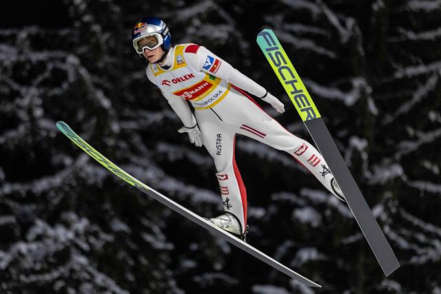Austria Stephan Embacher soars through the air during the Men's Large Hill HS140 Super Team competition of the FIS Ski Jumping World Cup in Zakopane, Poland on January 10, 2026. (Photo by Wojtek RADWANSKI / AFP)