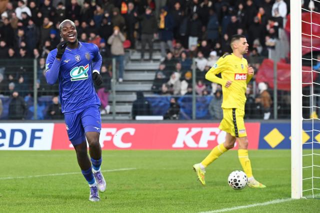 Monaco's French forward #19 George Ilenikhena celebrates scoring his team's third goal during the French Cup round of 32 football match between US Orleans and AS Monaco at the Stade de la Source in Orleans, central France on January 10, 2026. (Photo by JEAN-FRANCOIS MONIER / AFP)