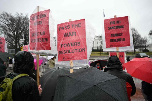 People protest against the recent US operation in Venezuela that resulted in the capture of the Venezuelan President, in Lafayette Square near the White House in Washington, DC, on January 10, 2026. (Photo by Mandel NGAN / AFP)