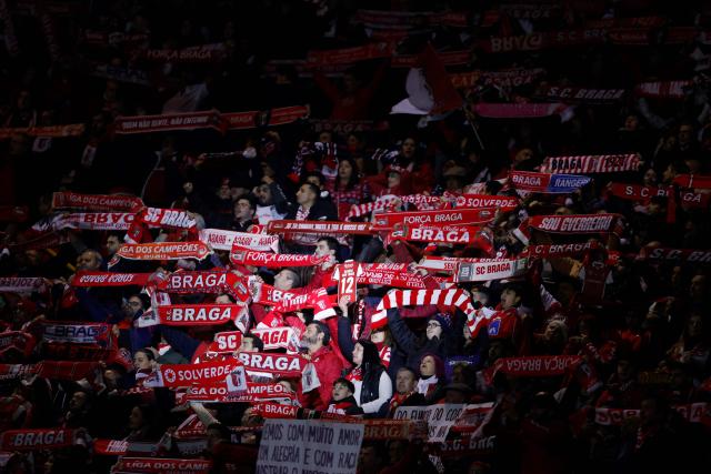 SC Braga's supporters cheer prior the Portuguese Taca da Liga (League Cup) final football match between Vitoria SC and SC Braga at the Dr. Magalhaes Pessoa stadium in Leiria, on January 10, 2026. (Photo by FILIPE AMORIM / AFP)