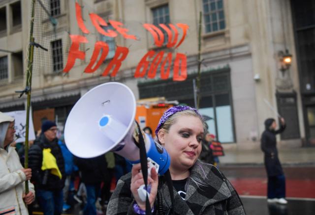 Protesters gather outside of the ICE Field office in Philadelphia, Pennsylvania during a protest against ICE and the killing of Renee Good on Saturday, January 10, 2025. A US Immigration and Customs Enforcement (ICE) agent shot and killed an American woman on the streets of Minneapolis January 7, leading to huge protests and outrage from local leaders who rejected White House claims she was a domestic terrorist. The woman, identified in local media as 37-year-old Renee Nicole Good, was hit at point blank range as she apparently tried to drive away from agents who were crowding around her car, which they said was blocking their way. (Photo by Matthew HATCHER / AFP)