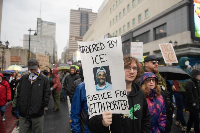 Protesters gather outside of the ICE Field office in Philadelphia, Pennsylvania during a protest against ICE and the killing of Renee Good on Saturday, January 10, 2025. A US Immigration and Customs Enforcement (ICE) agent shot and killed an American woman on the streets of Minneapolis January 7, leading to huge protests and outrage from local leaders who rejected White House claims she was a domestic terrorist. The woman, identified in local media as 37-year-old Renee Nicole Good, was hit at point blank range as she apparently tried to drive away from agents who were crowding around her car, which they said was blocking their way. (Photo by Matthew HATCHER / AFP)