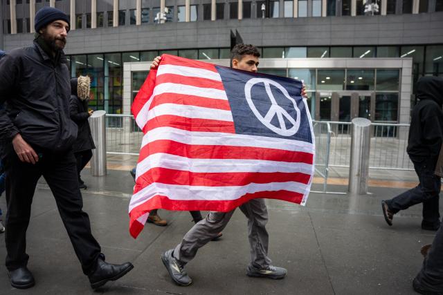 People rally against Immigration and Customs Enforcement (ICE) for the “ICE Out of New York for Good” protest outside of 26 Federal Plaza in New York City, US, January 10, 2026. A US Immigration and Customs Enforcement (ICE) agent shot and killed an American woman on the streets of Minneapolis January 7, leading to huge protests and outrage from local leaders who rejected White House claims she was a domestic terrorist. The woman, identified in local media as 37-year-old Renee Nicole Good, was hit at point blank range as she apparently tried to drive away from agents who were crowding around her car, which they said was blocking their way. (Photo by Angelina Katsanis / AFP)