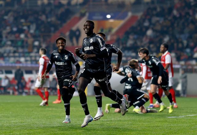 Vitoria Guimaraes's Senegalese forward # 90 Alioune Ndoye celebrates scoring his team's second goal during the Portuguese Taca da Liga (League Cup) final football match between Vitoria SC and SC Braga at the Dr. Magalhaes Pessoa stadium in Leiria, on January 10, 2026. (Photo by FILIPE AMORIM / AFP)