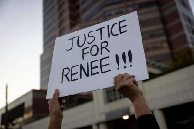 A person holds up a sign during a protest in Los Angeles, California on January 10, 2026 against US Immigration and Customs Enforcement (ICE) after the fatal shooting of Renee Nicole Good in Minneapolis. A US Immigration and Customs Enforcement (ICE) agent shot and killed 37-year-old Renee Nicole Good on the streets of Minneapolis on January 7, leading to huge protests and outrage from local leaders who rejected White House claims she was a domestic terrorist. (Photo by ETIENNE LAURENT / AFP)