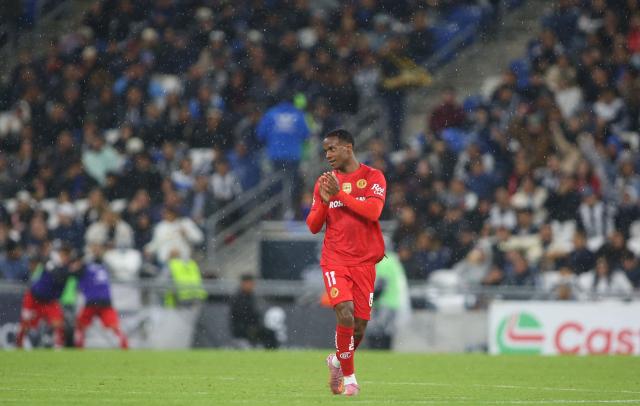 Toluca's Brazilian midfielder #11 Helinho celebrates after scoring the opening goal during the Liga MX Clausura football match between Monterrey and Toluca at BBVA Stadium in Monterrey, Nuevo Leon state, Mexico on January 10, 2026. (Photo by Julio Cesar AGUILAR / AFP)