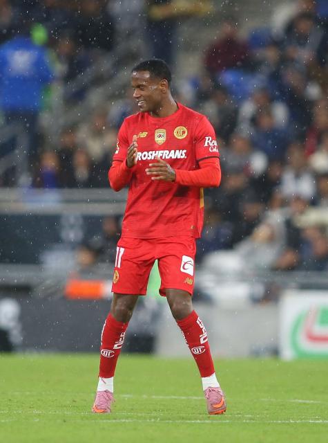Toluca's Brazilian midfielder #11 Helinho celebrates after scoring the opening goal during the Liga MX Clausura football match between Monterrey and Toluca at BBVA Stadium in Monterrey, Nuevo Leon state, Mexico on January 10, 2026. (Photo by Julio Cesar AGUILAR / AFP)