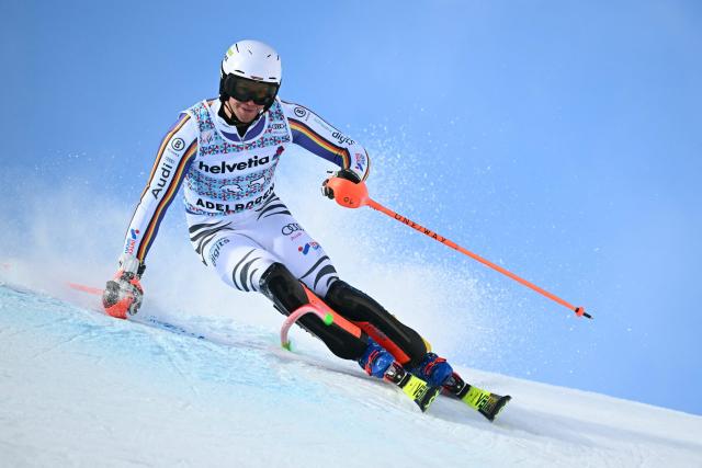 Germany’s Sebastian Holzmann competes in the first run of the Men's Slalom, part of the FIS Alpine Ski World Cup 2025-2026 in Adelboden, soutwestern Switzerland on January 11, 2026. (Photo by Fabrice COFFRINI / AFP)