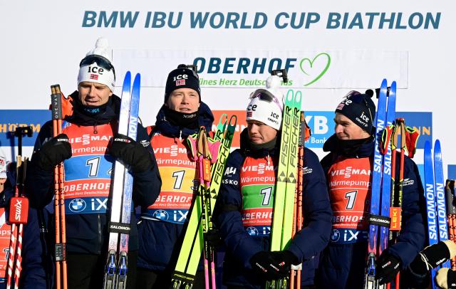 The winning team of Norway with (L-R) Norway's Vetle Sjastad Christiansen, Norway's Martin Uldal, Norway's Johannes Dale-Skjevdal and Norway's Isak Frey pose on the podium after the men's 4x7,5km relay event of the IBU Biathlon World Cup in Oberhof, eastern Germany on January 11, 2026. (Photo by Tobias SCHWARZ / AFP)