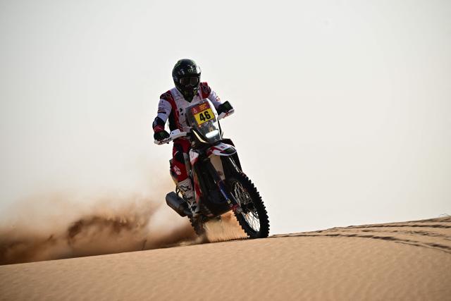 Botswanan rider Ross Branch competes with a Hero 450 Rally in the Stage 7 of the 48th edition of the Dakar Rally 2026, between Riyadh and Wadi ad-Dawasir, Saudi Arabia, on January 11, 2026. (Photo by Giuseppe CACACE / AFP)