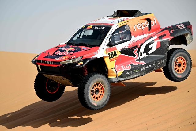 Toyota Gazoo Racing W2rc’s Australian driver Toby Price and Spanish co?pilot Armand Monleon compete in the Stage 7 of the 48th edition of the Dakar Rally 2026, between Riyadh and Wadi ad-Dawasir, Saudi Arabia, on January 11, 2026. (Photo by Giuseppe CACACE / AFP)