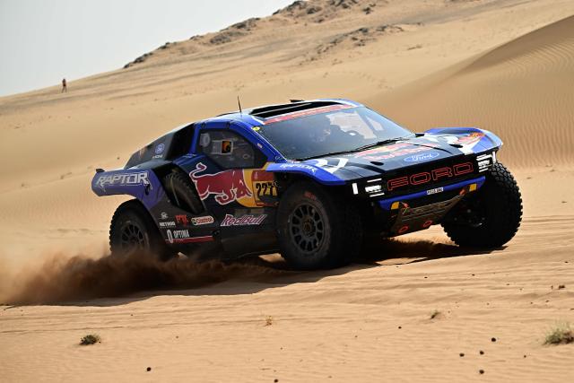 Ford Racing’s Spanish driver Nani Roma and Spanish co?pilot Alex Haro compete in the Stage 7 of the 48th edition of the Dakar Rally 2026, between Riyadh and Wadi ad-Dawasir, Saudi Arabia, on January 11, 2026. (Photo by Giuseppe CACACE / AFP)