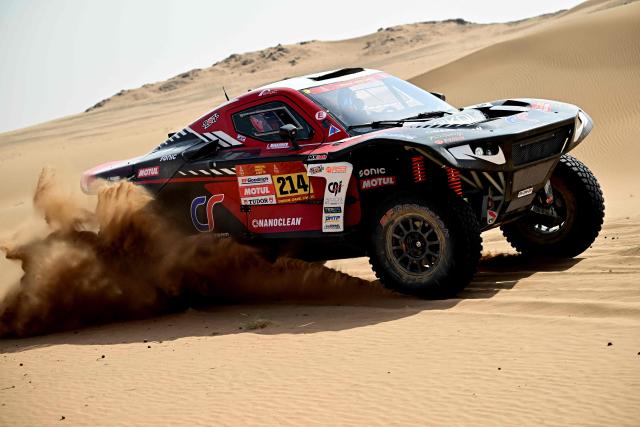 Century Racing Factory Team’s French driver Mathieu Serradori and French co?pilot Loпc Minaudier compete in the Stage 7 of the 48th edition of the Dakar Rally 2026, between Riyadh and Wadi ad-Dawasir, Saudi Arabia, on January 11, 2026. (Photo by Giuseppe CACACE / AFP)