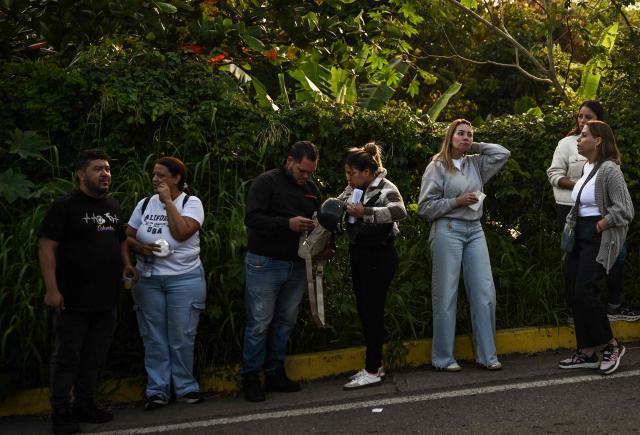 Relatives of prisoners queue outside El Rodeo I prison in Guatire, Miranda State, some 30 kilometers east of Caracas on January 11, 2026. Venezuelans were waiting for more political prisoners to be released, as ousted president Nicolas Maduro defiantly claimed from his US jail cell that he is "doing fine" after being seized by US forces a week ago. (Photo by Ronaldo SCHEMIDT / AFP)