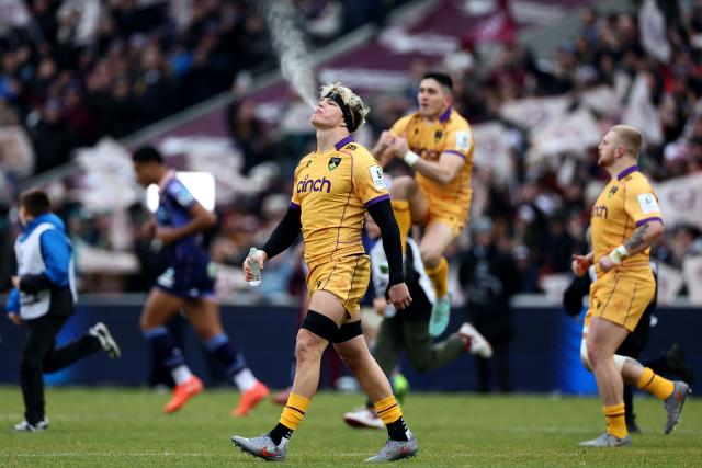 Northampton Saints' English number 8 Henry Pollock (C) arrives on the picth before the start of the European Champions Cup first round, day 3, pool 4, rugby union match between Bordeaux-Begles and Northampton Saints at the Chaban-Delmas stadium in Bordeaux on January 11, 2026. (Photo by ROMAIN PERROCHEAU / AFP)