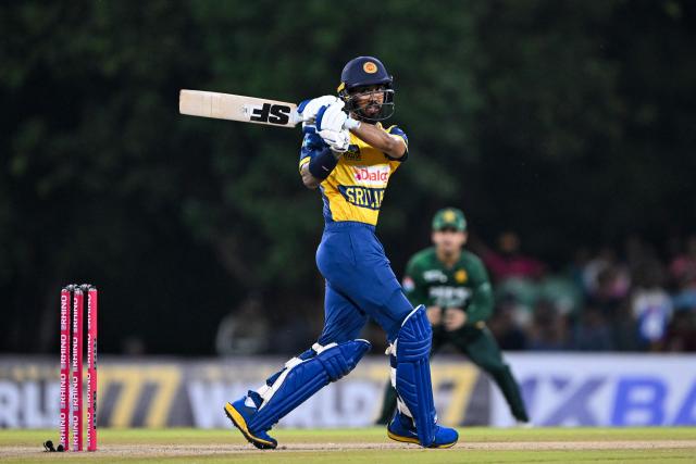 Sri Lanka's Kamil Mishara watches the ball after playing a shot during the third and final Twenty20 international cricket match between Pakistan and Sri Lanka at the Rangiri Dambulla International Stadium in Dambulla on January 11, 2026. (Photo by Ishara S. KODIKARA / AFP)