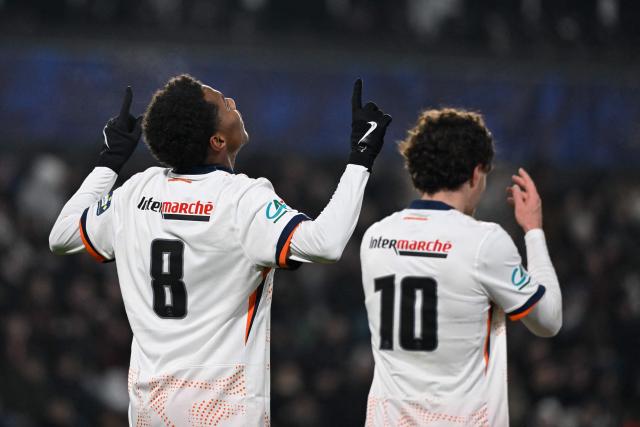 Montpellier’s French forward #08 Yanis Issoufou (L) celebrates his goal during the French Cup round of 32 football match between FC Metz and Montpellier HSC at the Saint-Symphorien stadium in Metz, eastern France on January 11, 2026. (Photo by Jean-Christophe VERHAEGEN / AFP)