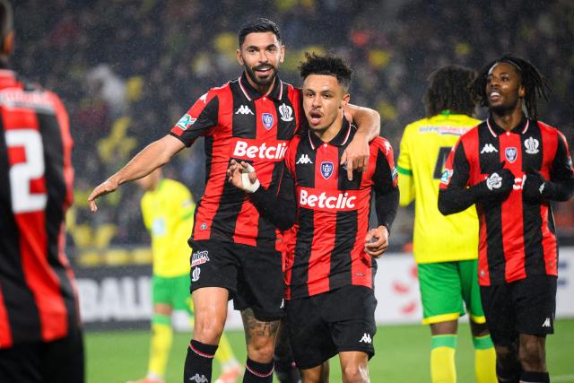 Nice's Moroccan forward #10 Sofiane Diop (2nd-R) celebrates with teammates after he scored his team's first goal during the French Cup round of 32 football match between FC Nantes and OGC Nice at the Stade de la Beaujoire–Louis Fonteneau in Nantes, western France on January 11, 2026. (Photo by Loic VENANCE / AFP)
